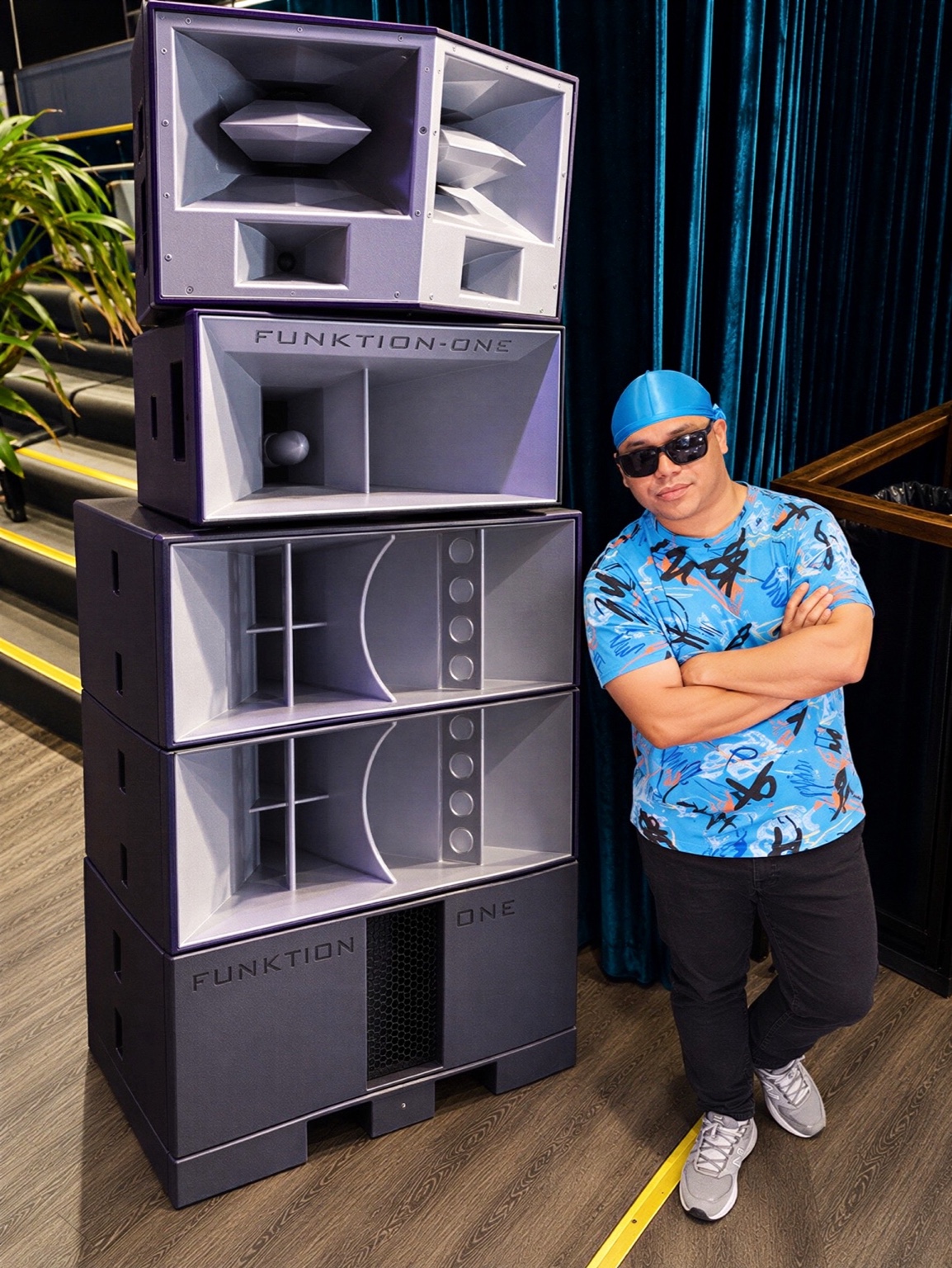 Angel X beside a Funktion-One speaker stack
